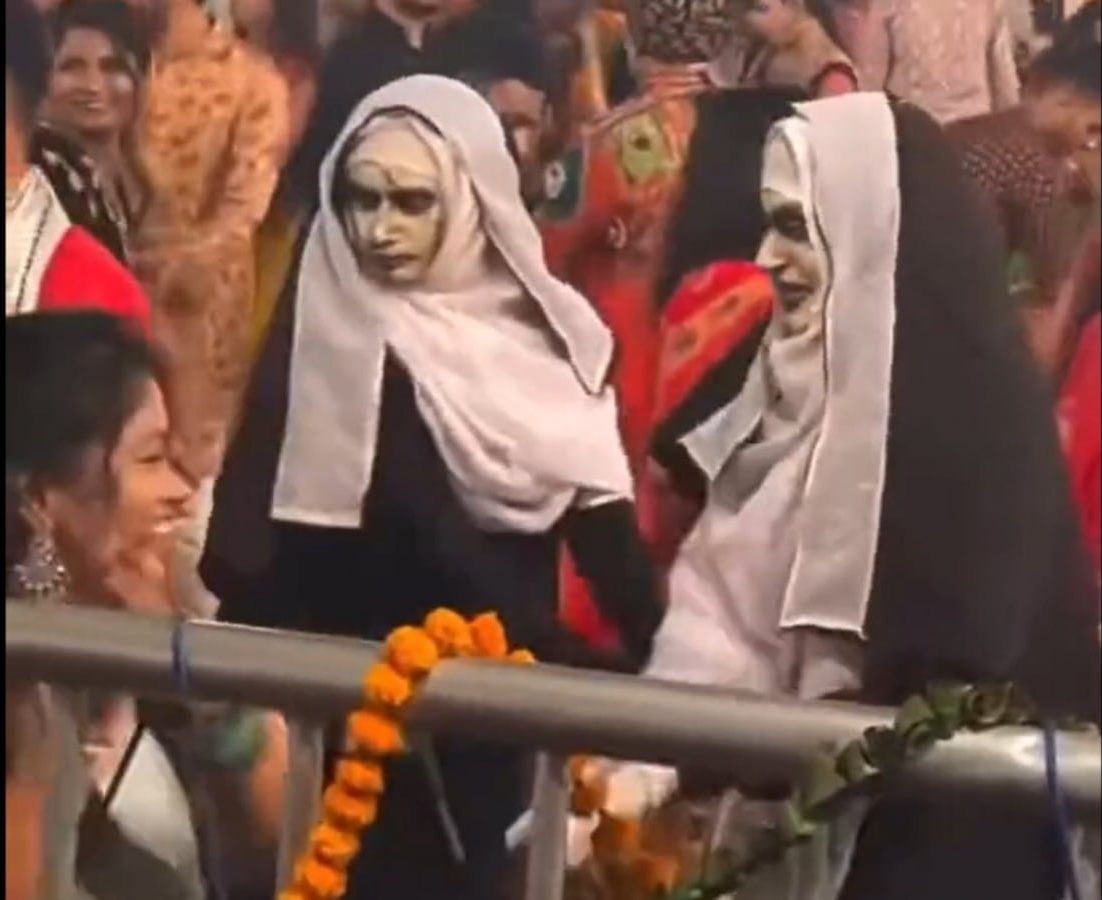 The nun doing garba 1698118952211 1698118961242 e1698146264678