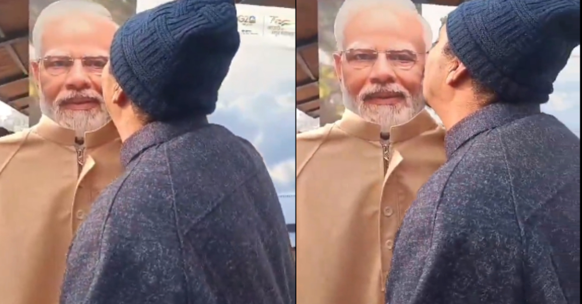 Kashmiri Man Kisses PM Modi Cutout