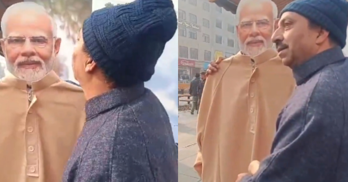 Kashmiri Man Kisses PM Modi Cutout