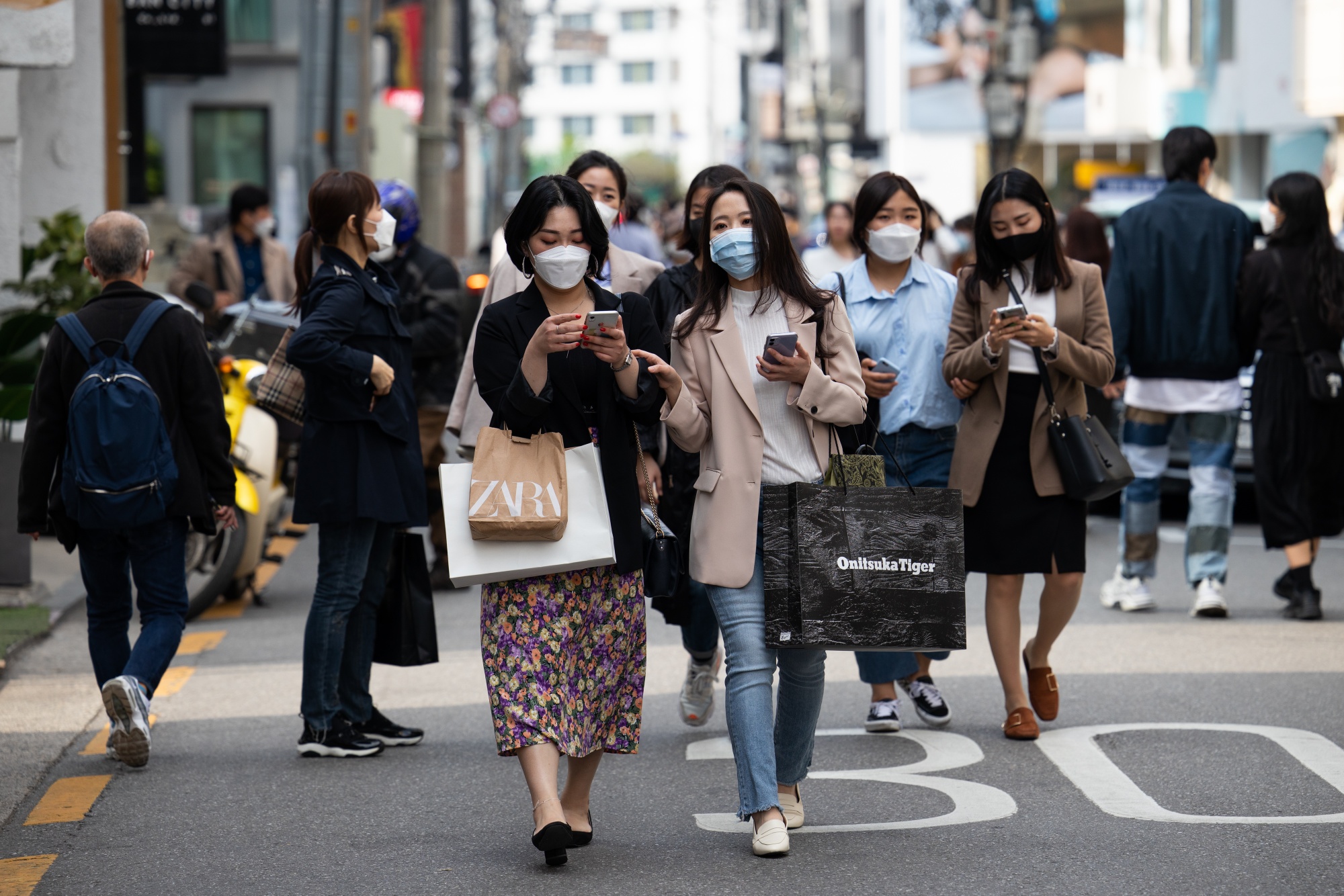 why fertility rate is decreasing in the south korea india japan 