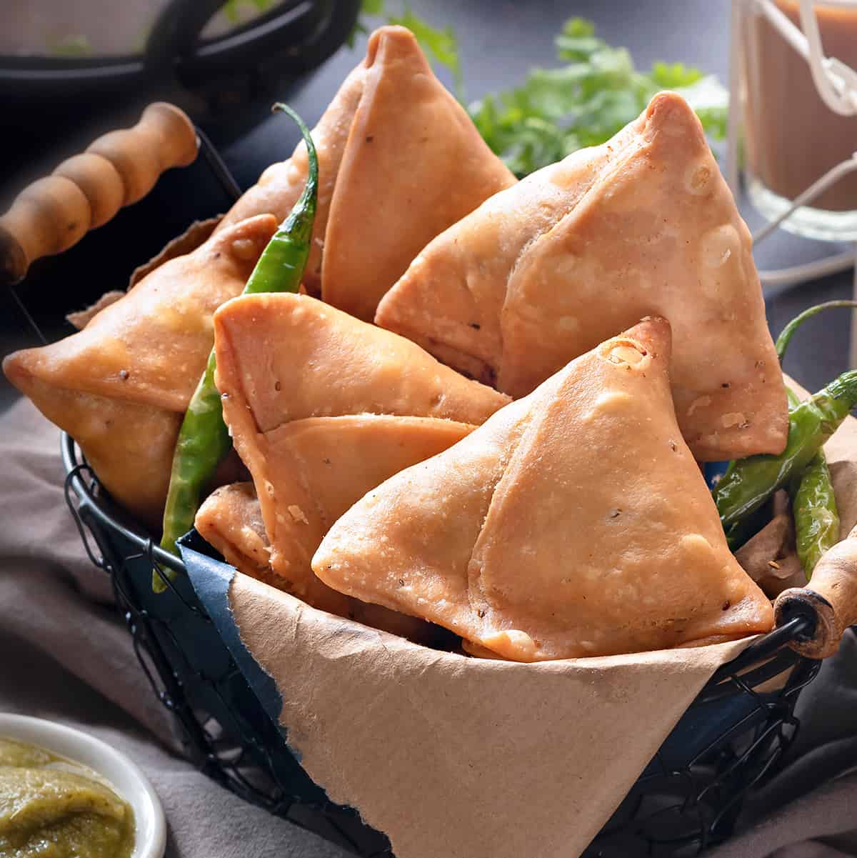 street food vendor is seen selling bhindi samosas 