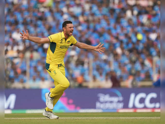 ahmedabad australias josh hazlewood celebrates the wicket of indias ravindra