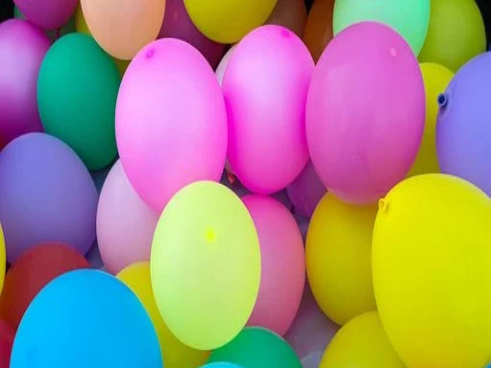 Man Sleeps With Balloons