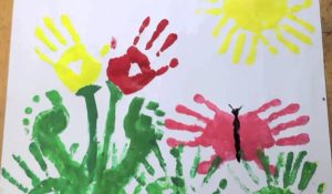Place children's handprints and drawings